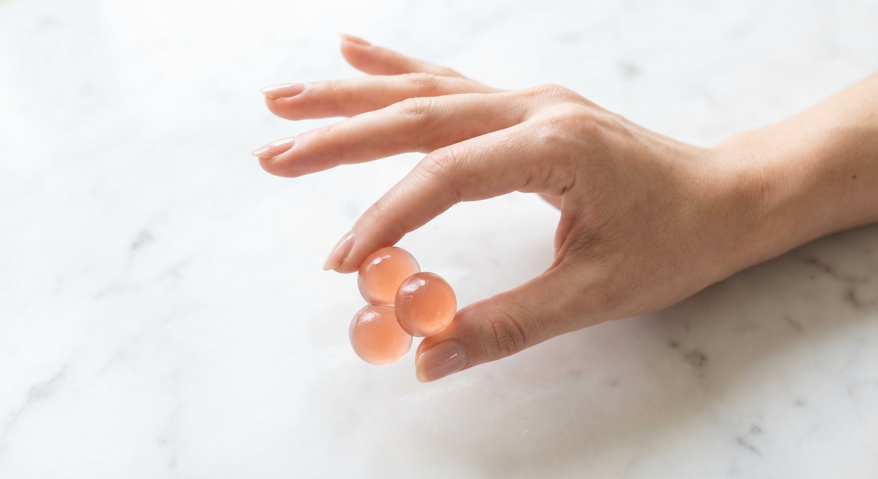 Hand holding Daye gummies